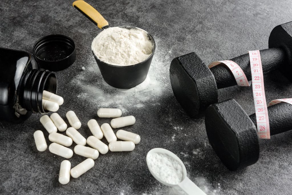 suplementos alimentares, whey protein, peso de academia